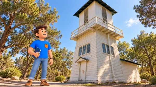 Voyageur observant le château d’eau historique de Tule Springs Ranch